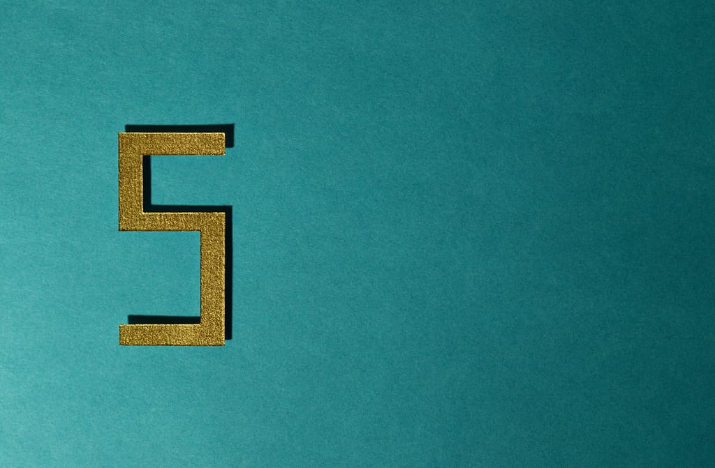 A gold cardboard cutout of the number 5 sits on a teal background indicating the number of things people have done for me in the article below it.