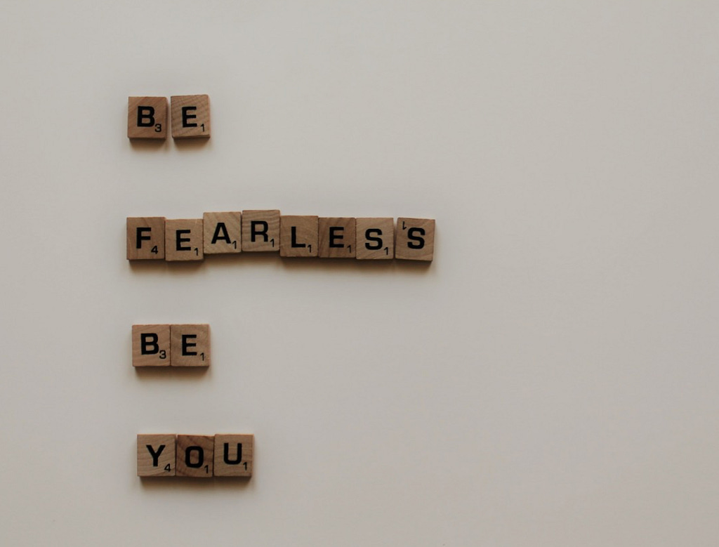 scrabble tiles spelling out "Be Fearless Be You"